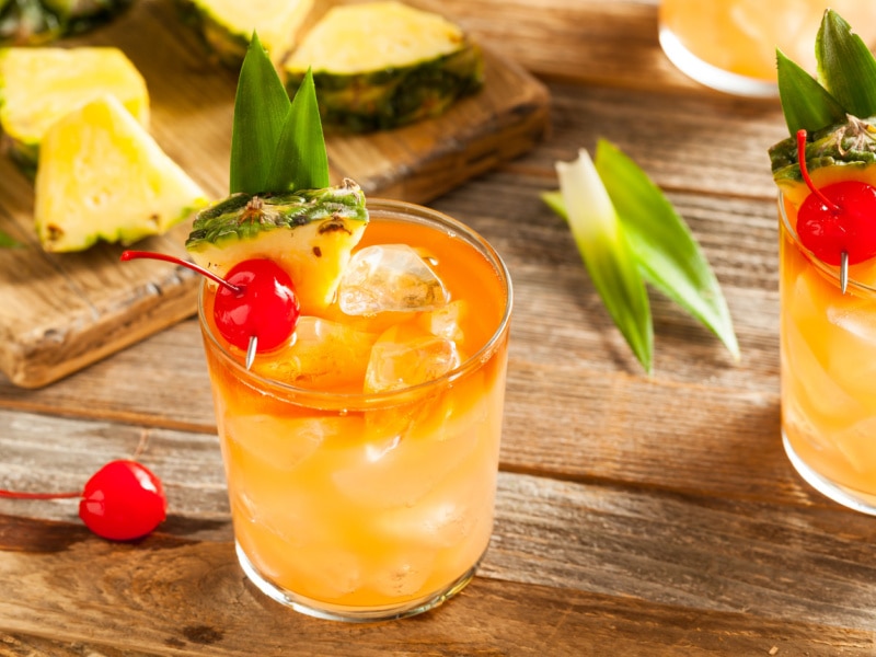 Mai Tai Cocktail With Dark Rum Garnished With Fresh Cherries
