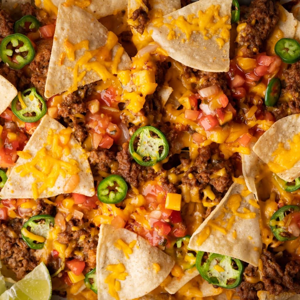 Homemade Nachos with Ground Beef Chili, Peppers and Corn