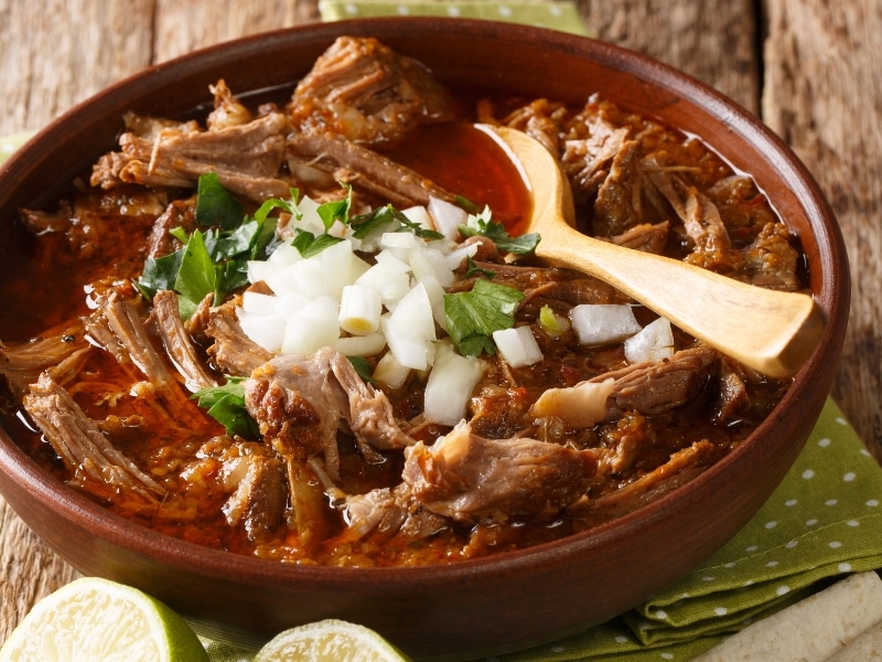 Homemade Spicy Birria with Goat Meat, Radish and Herbs