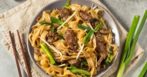 Homemade Beef Chow Fun Chinese Noodles with Scallions