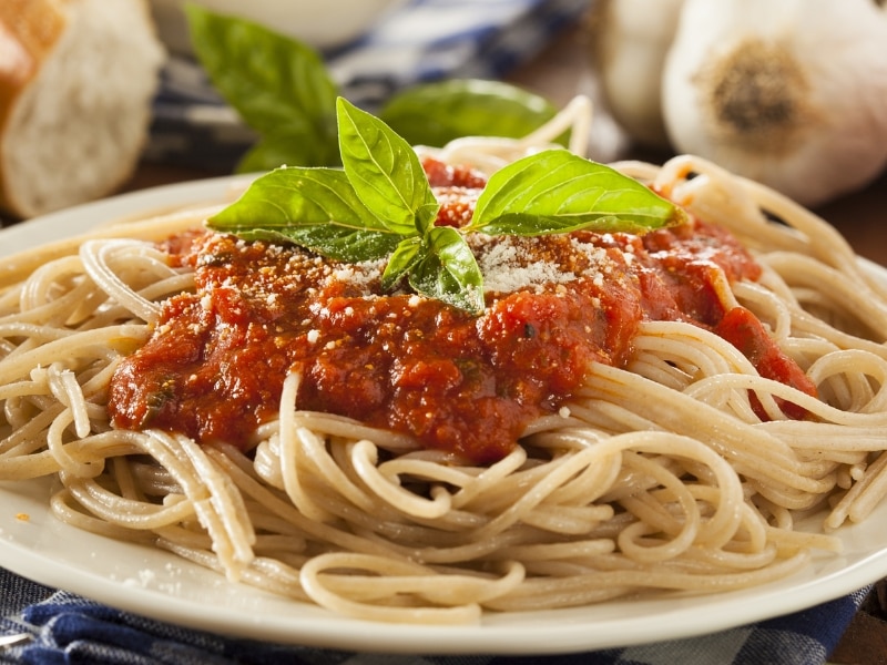 Spaghetti With Marinara Sauce Garnished With Fresh Basil

