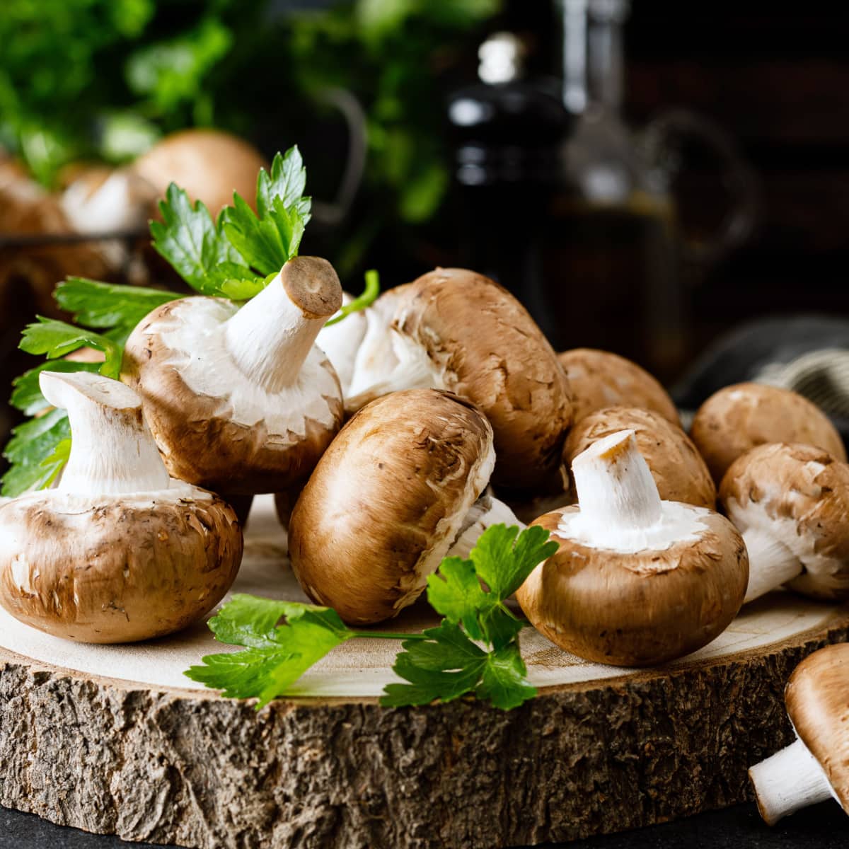Bunch of Mushrooms on a Wooden Chopping Board