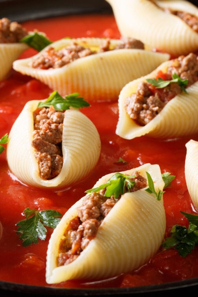 13 Easy Shell Pasta Recipes featuring Pasta Shells Stuffed with Ground Beef with Marinara Sauce