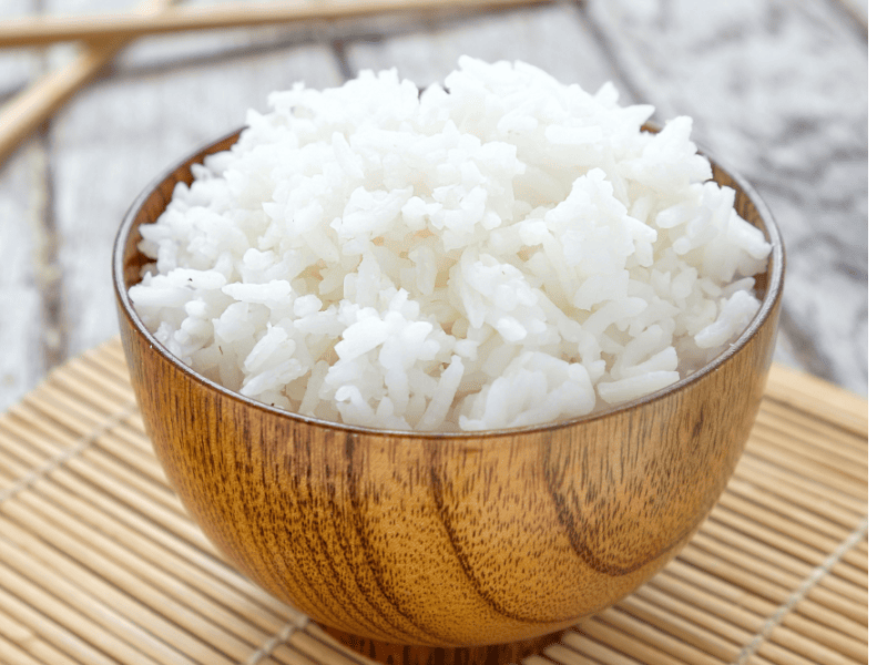 Cooked Rice in a Wooden Bowl