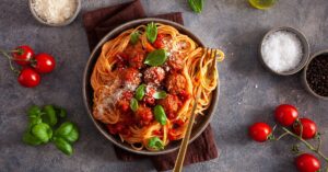 Savory Homemade Pasta with Meatballs and Tomatoes