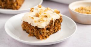 Sliced Homemade Moist Carrot Cake with Crushed Pineapple and Nuts