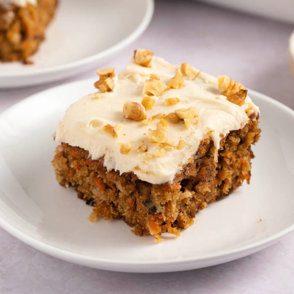 Sliced Homemade Moist Carrot Cake with Walnuts and Coconut