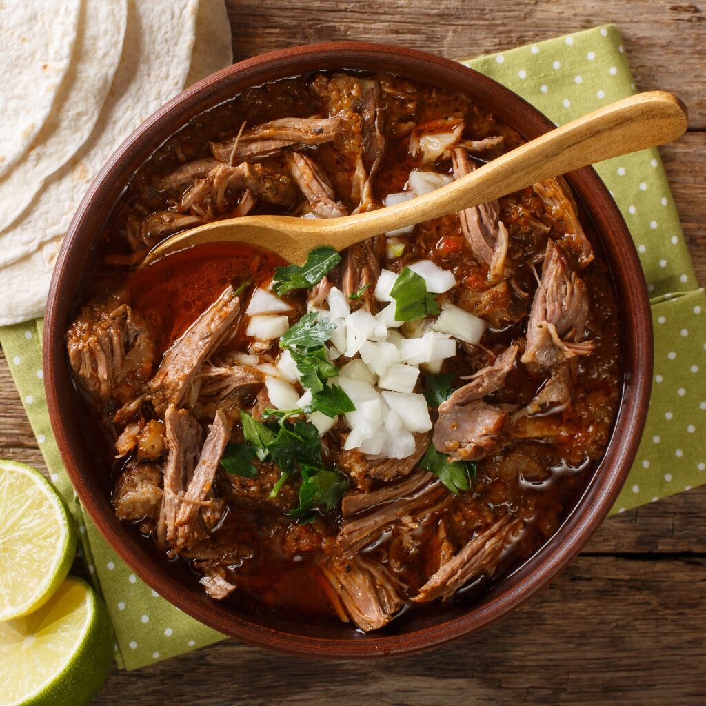 Spicy Stew Birria with Goat Meat and Herbs