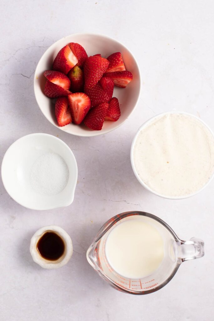 Strawberry Milkshake Ingredients - Strawberries, Vanilla Ice Cream, Milk, Sugar, Vanilla Extract