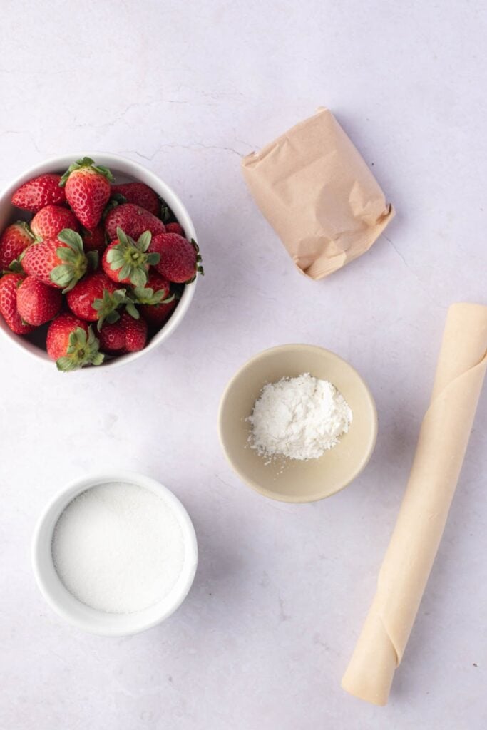 Strawberry Pie Ingredients - Strawberries, Pie Crust, Sugar, Cornstarch, Water and Whipped Cream

