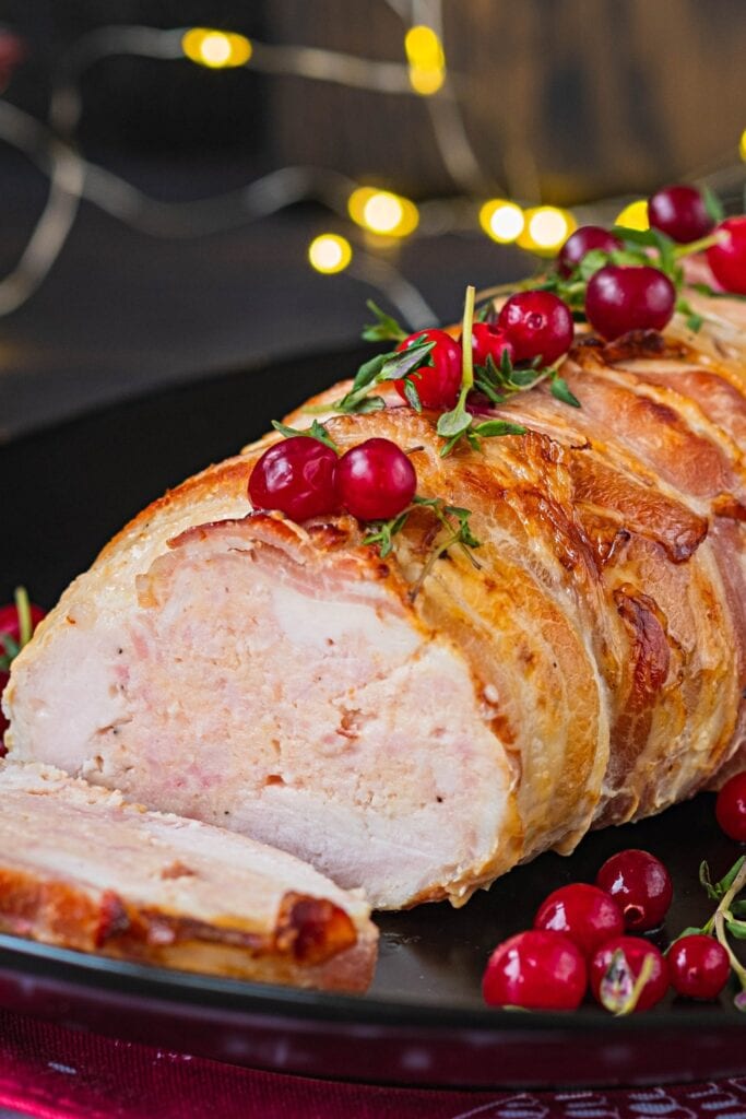 Whole Baked Turkey Wrapped in Bacon with Cranberry