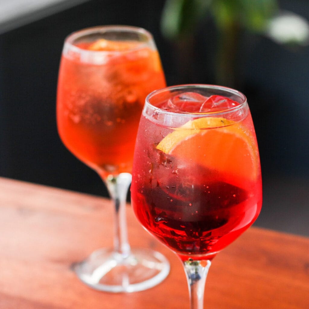 Aperol and Campari Cocktails on Goblet
