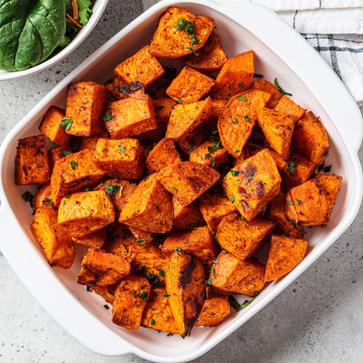 Baked Sweet Potatoes in a White Baking Dish