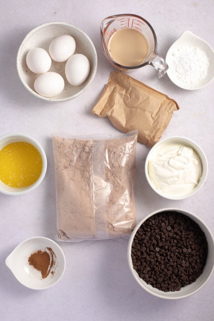 Chocolate Kahlua Cake Ingredients - Cake and Pudding Mix, Sour Cream, Egg, Kahlua, Vegetable Oil, Cinnamon, Sugar and Chocolate Chips