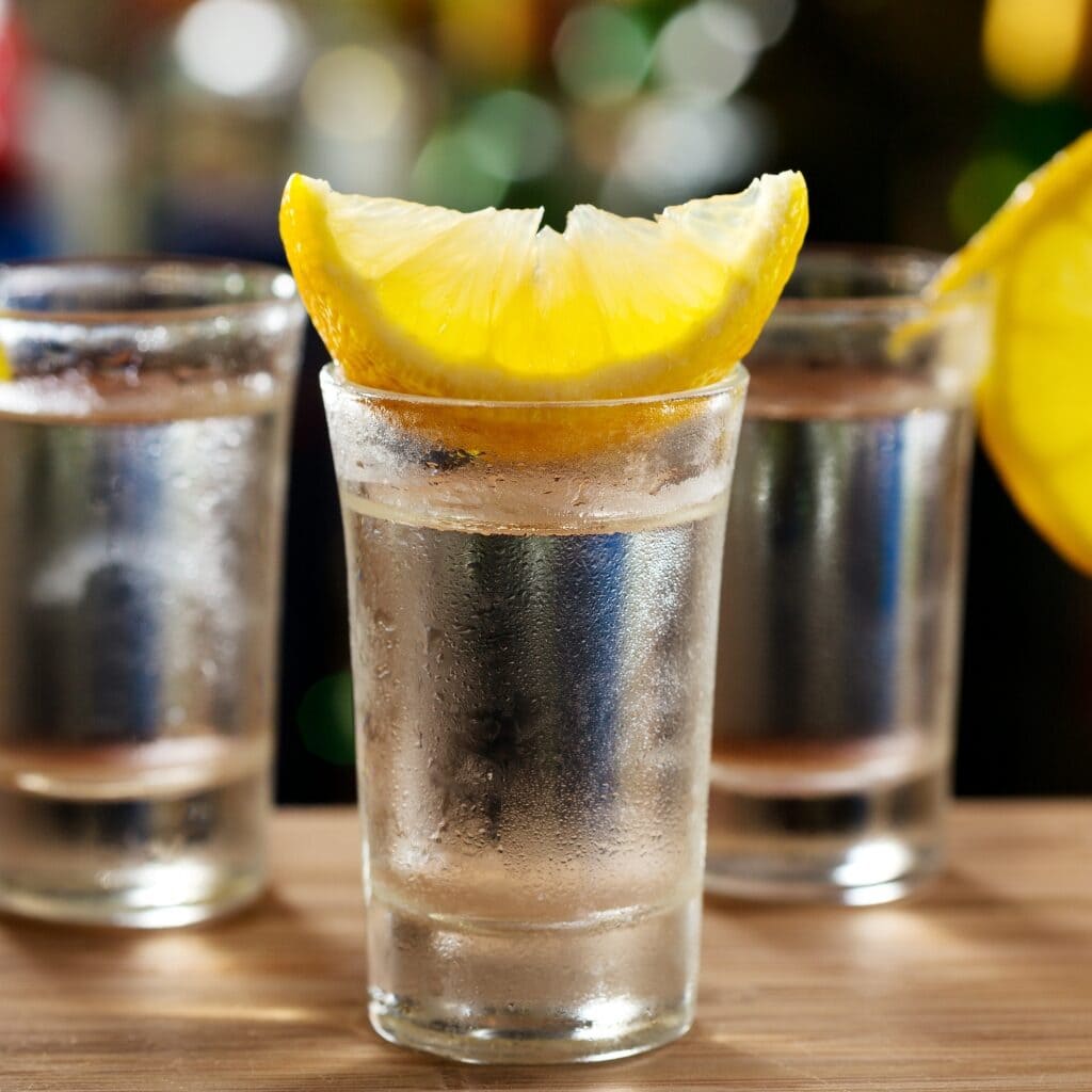 Cold Glasses of Vodka with Lemon