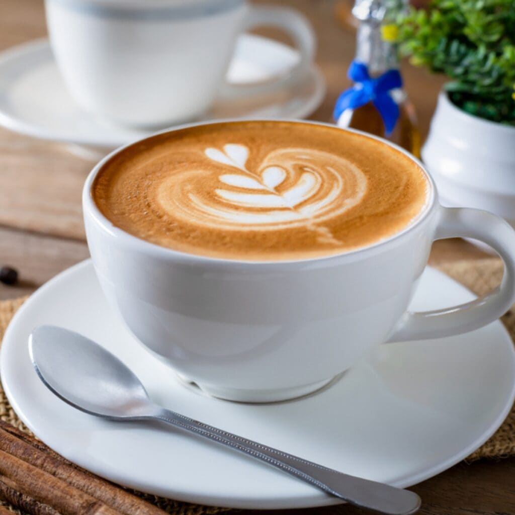 Cappuccino in a White Ceramic Mug
