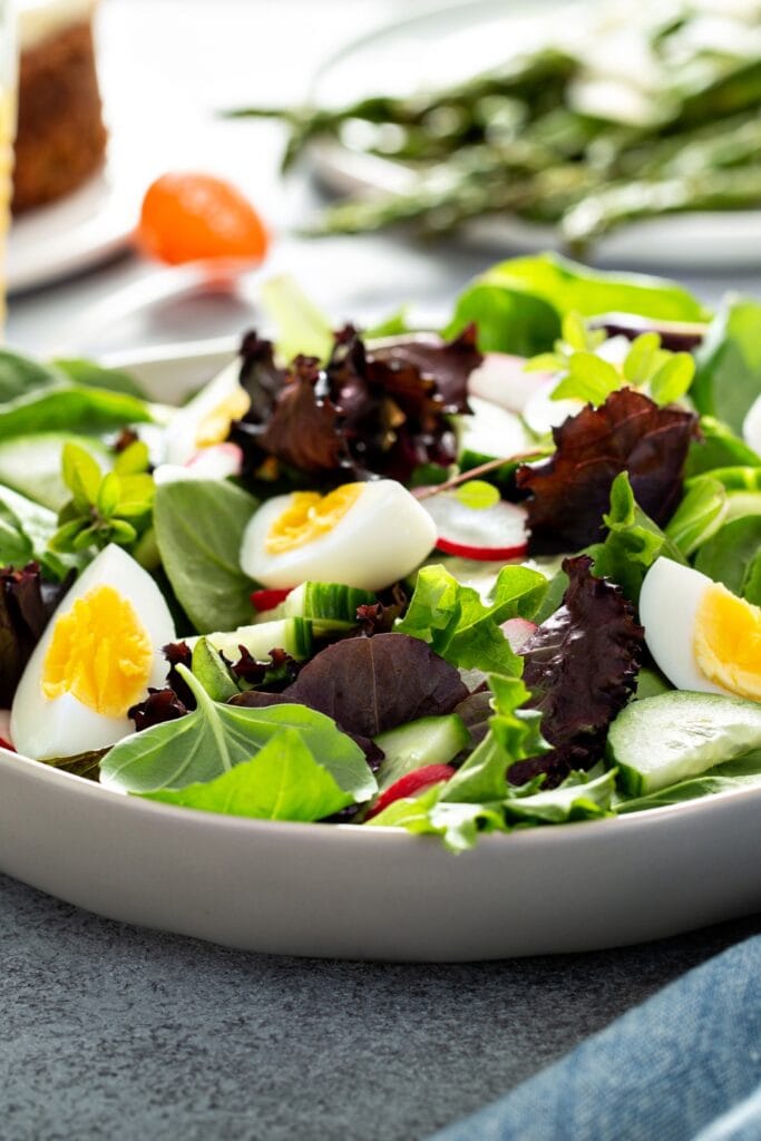 Fresh Easter Salad with Boiled Eggs, Cucumber and Radishes