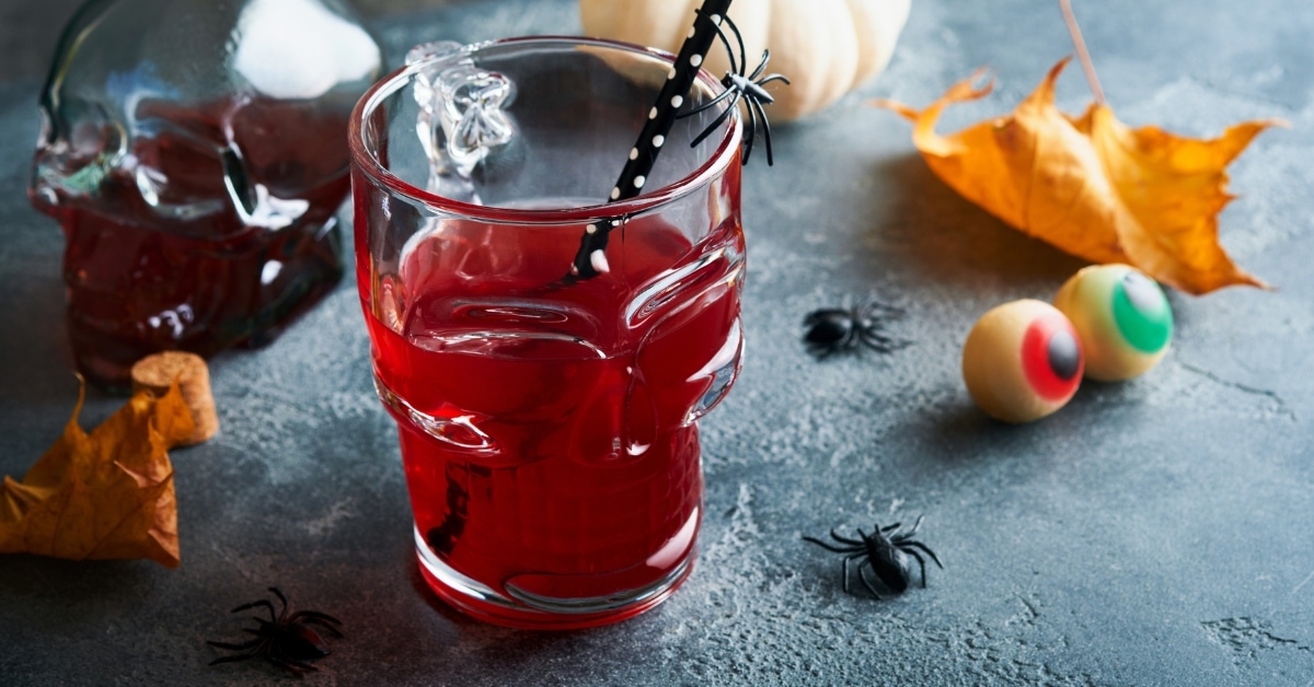 Halloween Red Tequila Cocktail in a Skull Glass Form