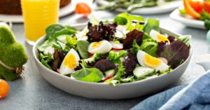 Healthy Homemade Spring Salad with Boiled Eggs, Cucumber and Radishes