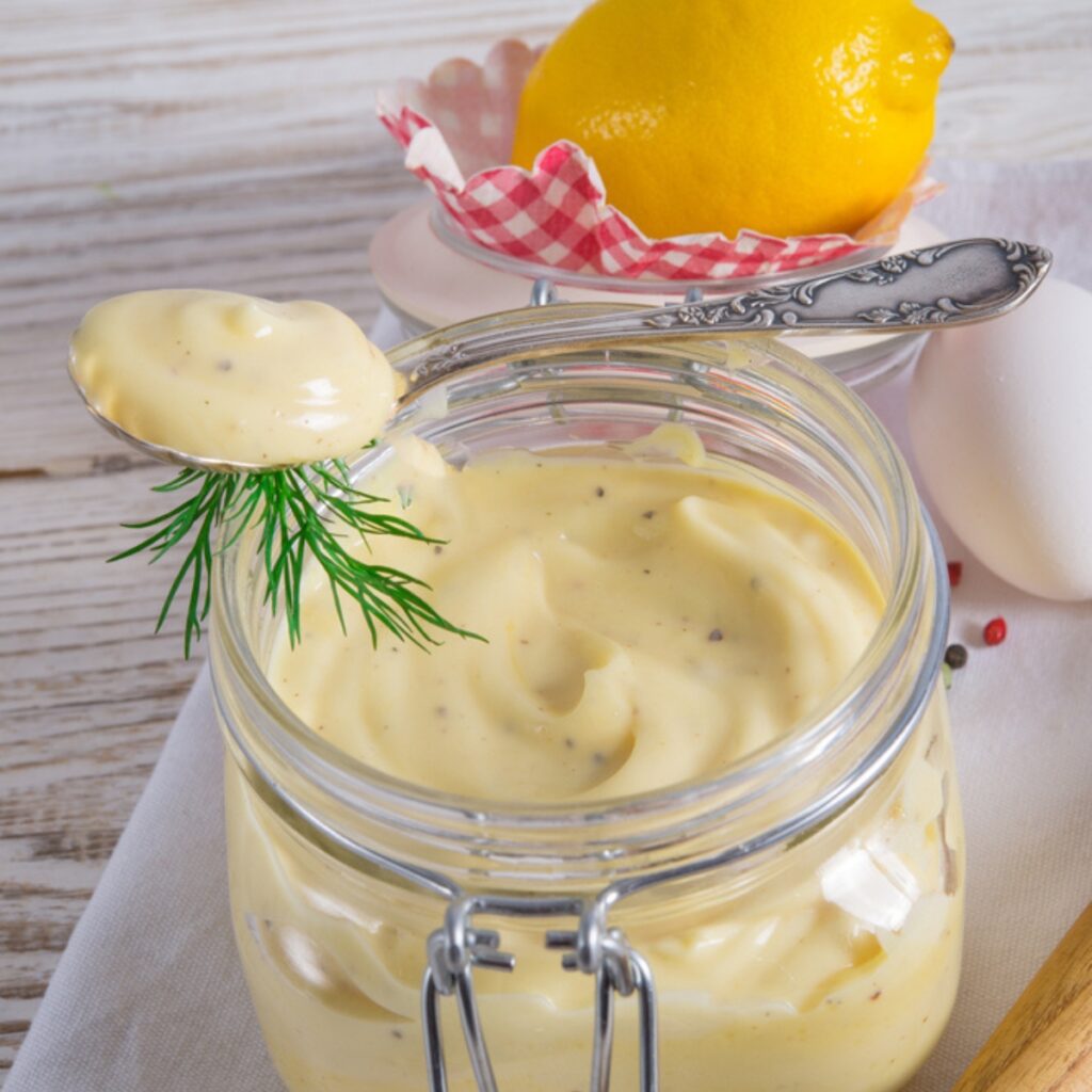 Homemade Kewpie Mayo in a Jar with a Spoon of Homemade Kewpie Mayo