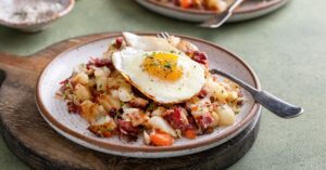 Homemade Corned Beef Potato Hash with Cabbage, Carrots and Egg