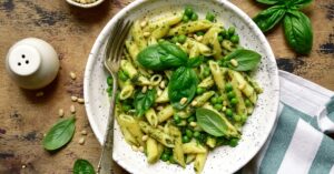 Homemade Penne Pasta with Basil, Pesto and Sweet Peas