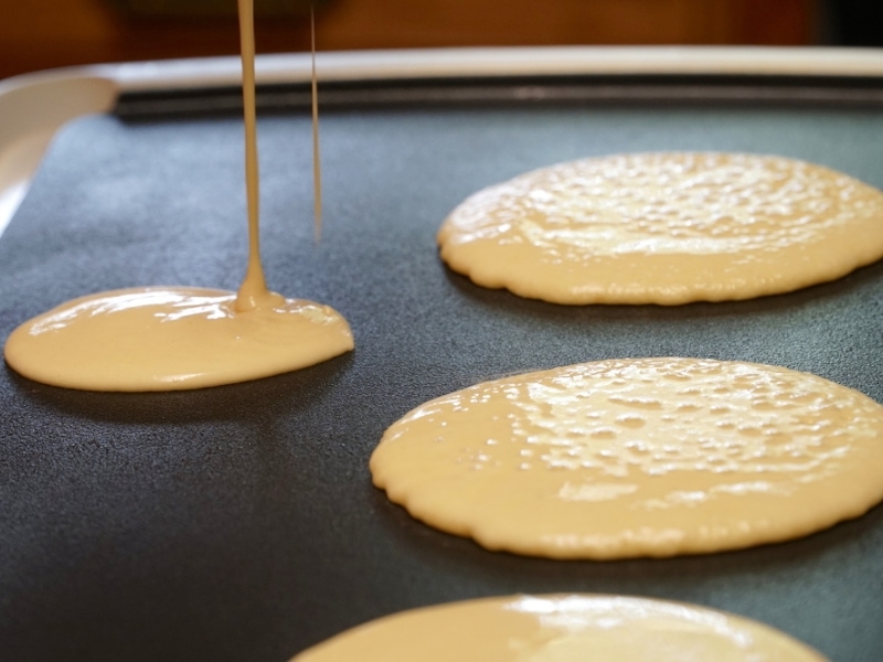 Pancake Batter poured in a How Electric Griddle