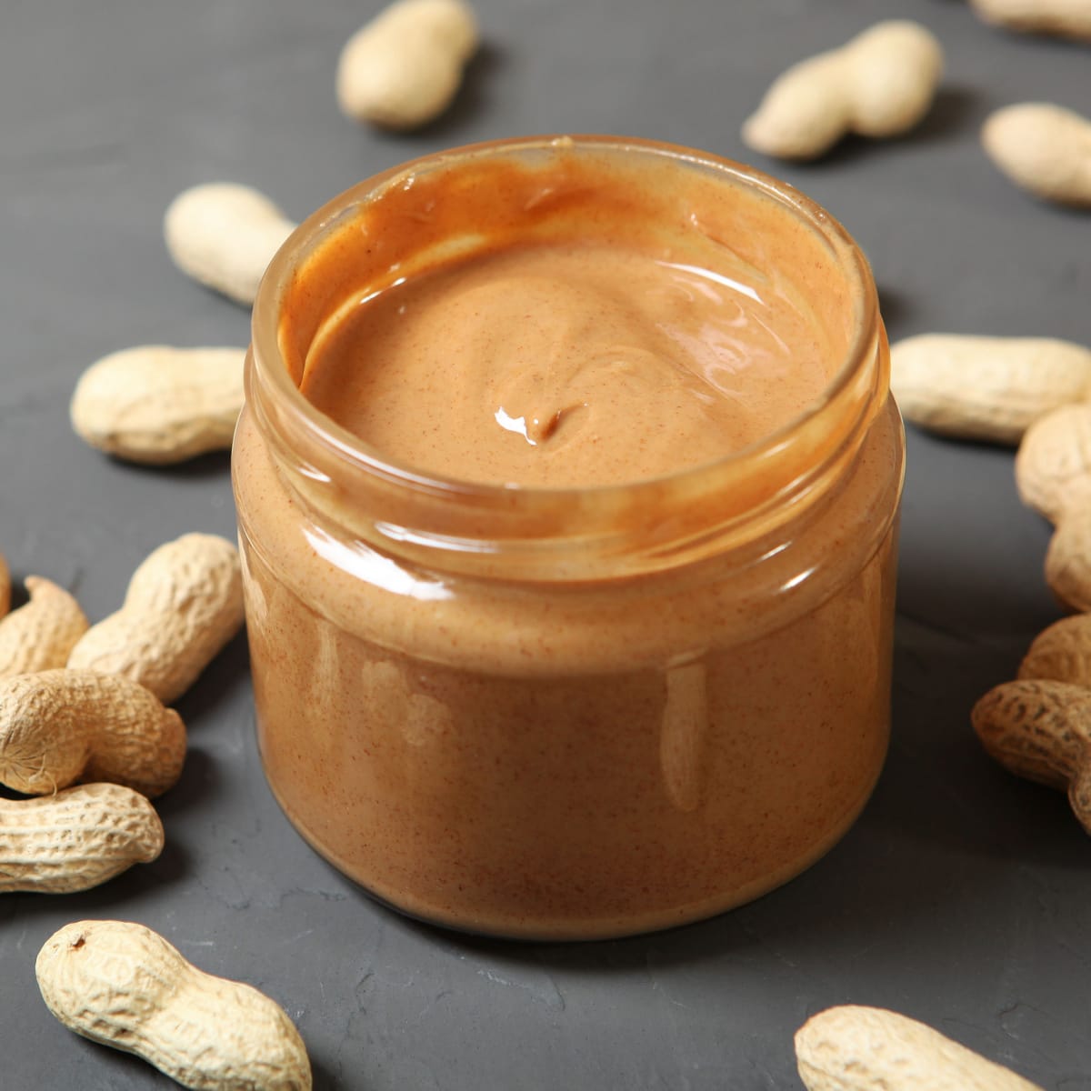 jar of peanut butter and peanuts