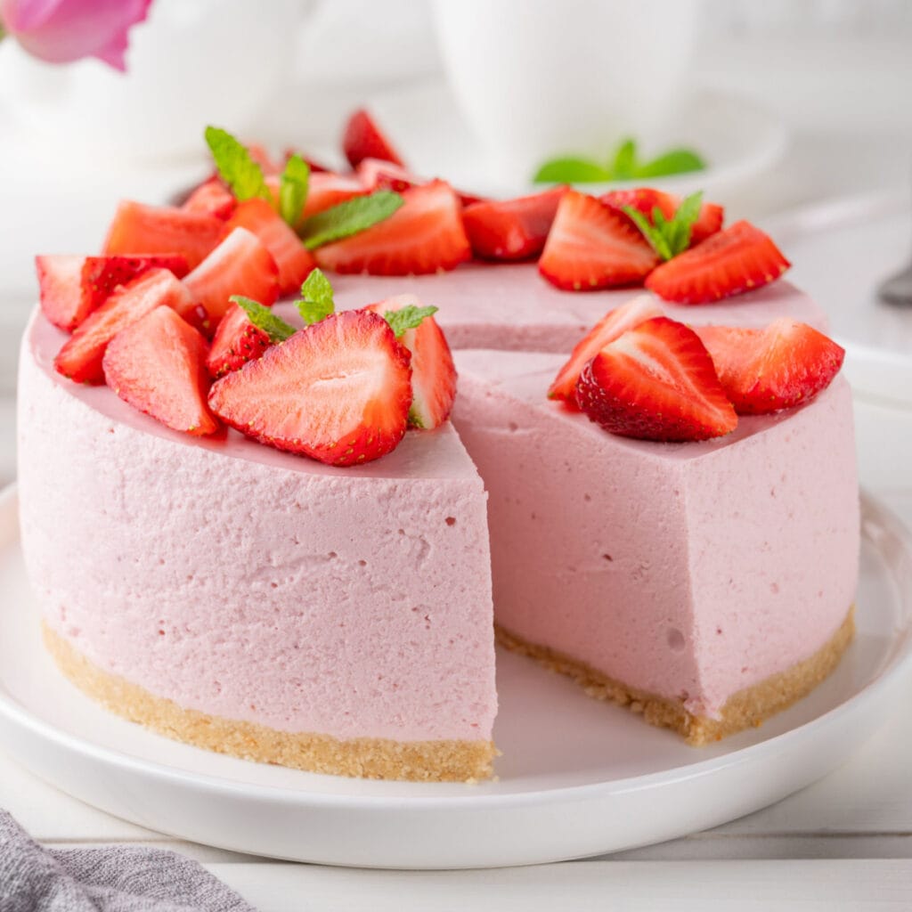 How to Freeze Cake (The Right Way!): Pink Cheese Cake with Fresh Strawberries on Top