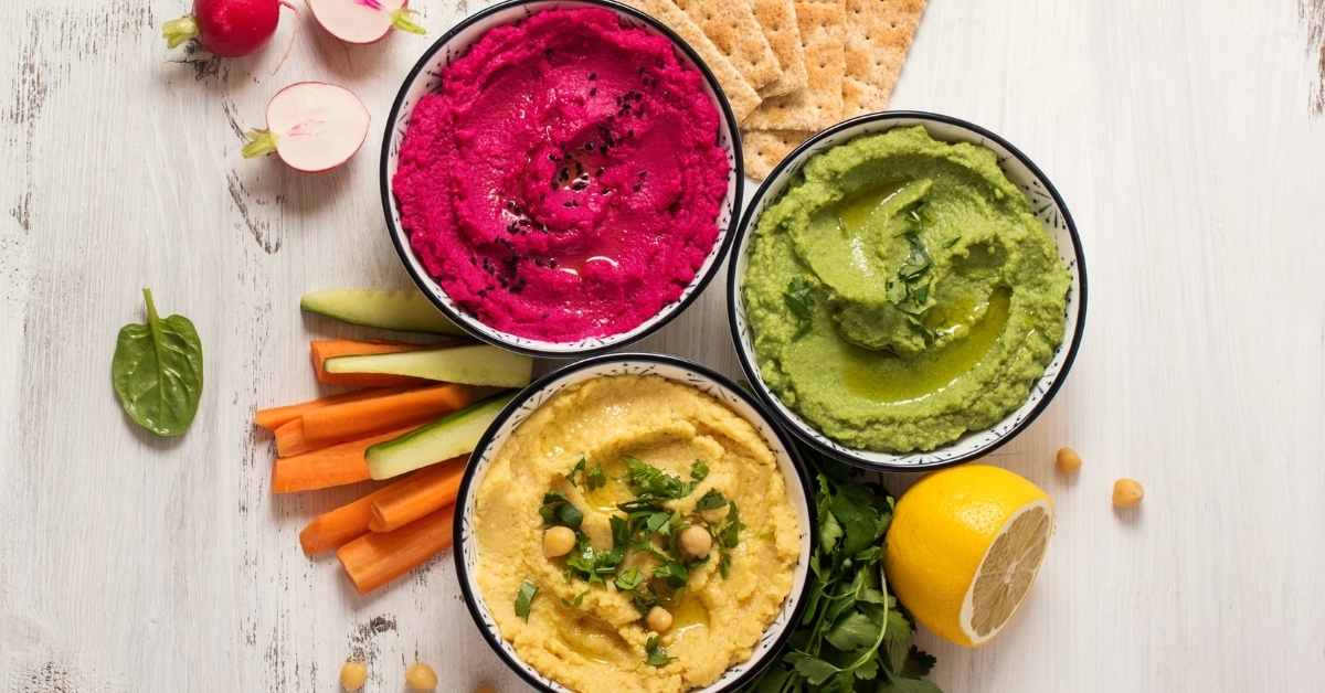 Various Hummus Vegetarian Dips Including Beetroot and Spinach