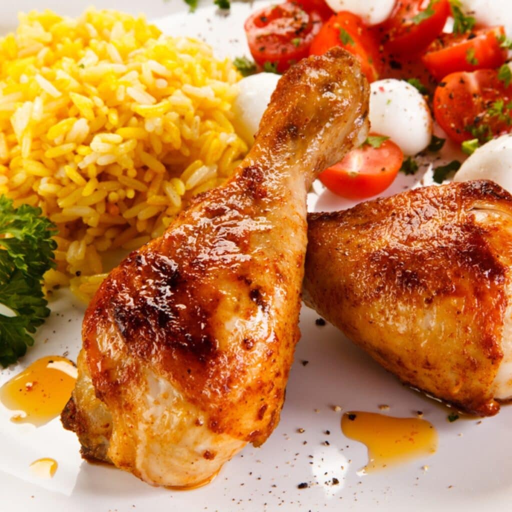 Baked Chicken Drumsticks With Rice And Vegetables