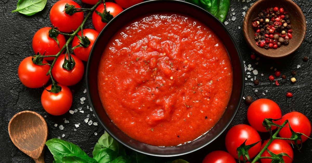Bowl of Tomato Passata or Puree with Fresh Tomatoes