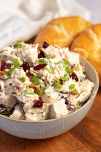 Creamy and Tangy Cranberry Chicken Salad with Green Onions Served with Bread