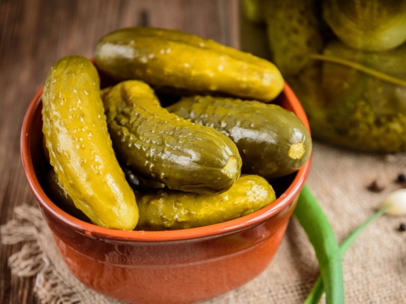 Dill Pickles in Brown Bowl
