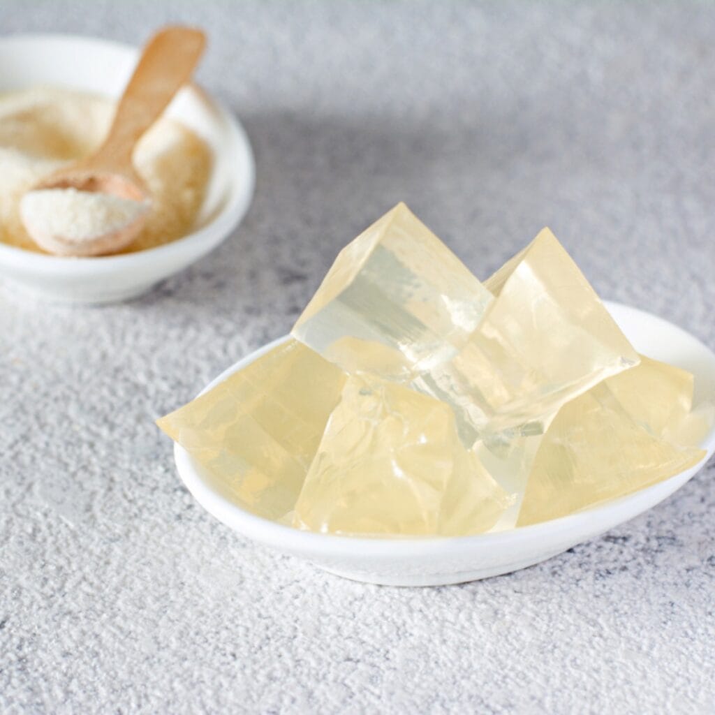 Gelatin Cubes and Powder in Two Ceramic Bowls