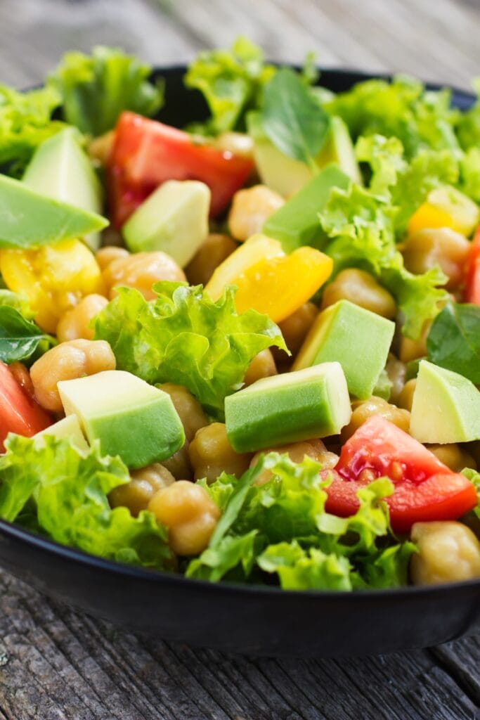 Healthy Avocado Salad with Chickpeas, Tomatoes and Lettuce