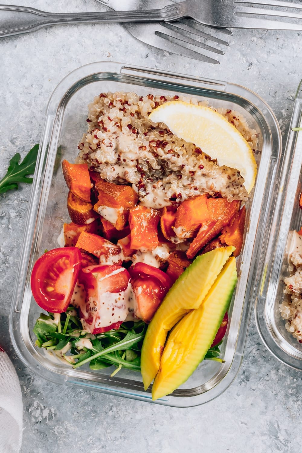 Healthy Meal Prep Quinoa Salad with Avocados, Tomatoes and Sweet Potatoes
