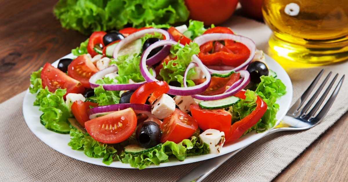 Healthy Salad with Lettuce, Onions, Tomatoes and Cheese