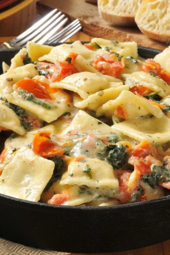 What To Serve With Lobster Ravioli featuring Homemade Lobster Ravioli with Tomatoes and Spinach