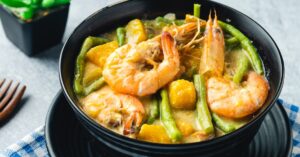 Homemade Sauteed Coconut Shrimp with Green Beans and Squash in Coconut Sauce