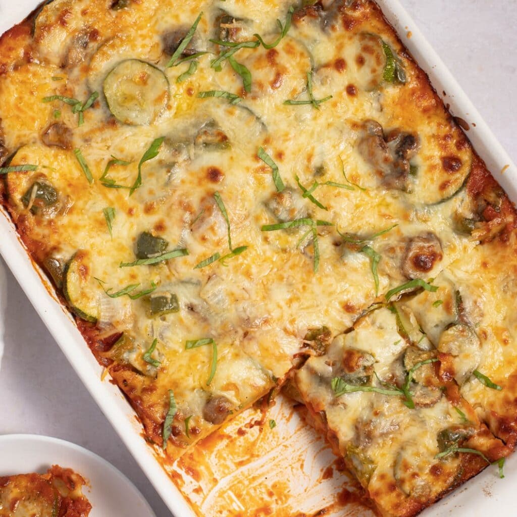 Homemade Vegetable Lasagna with Mushrooms, Zucchini in a White Casserole