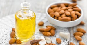 Homemade Almond Extract in a Bottle with Nuts