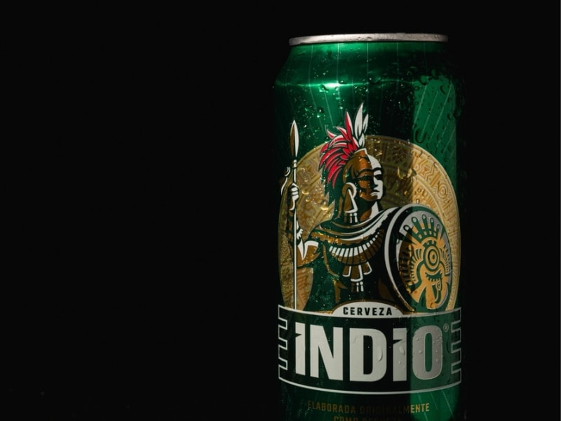 Can of Indio Beer Close Up Black Background