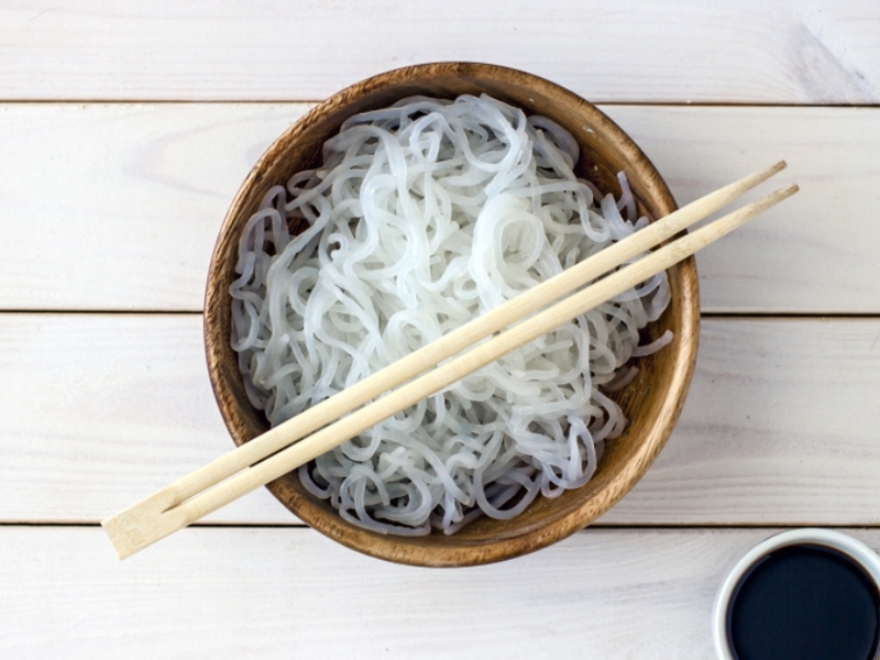 Chopsticks on Top of a Bowl of Cooked Plain Konjac Noodles