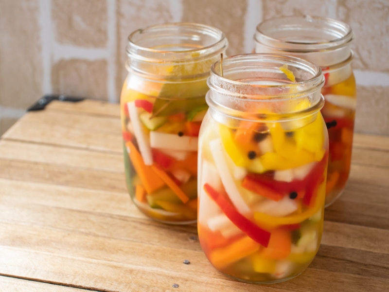 Vegetable Slices Pickled in Glass Jars