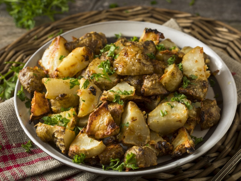 Roasted Sunchokes with Garlic and Cheese on a Plate
