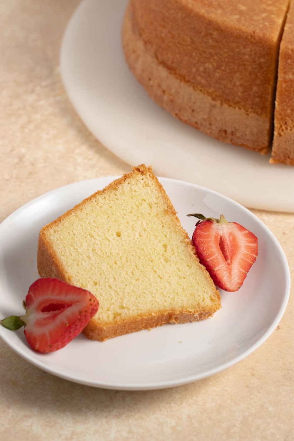 Sliced Homemade Sour Cream Pound Cake with Strawberries