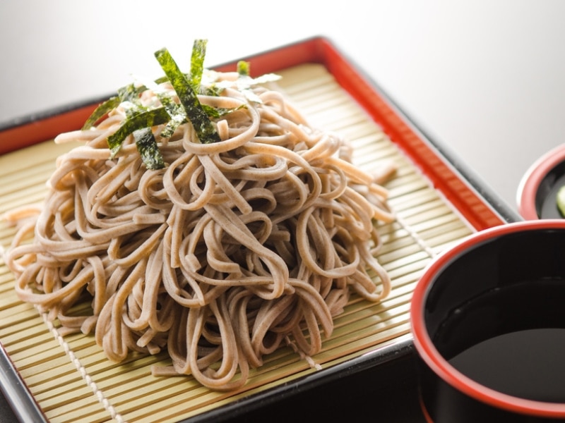 Soba Noodles Served With Seaweed Strips and Dipping on Side