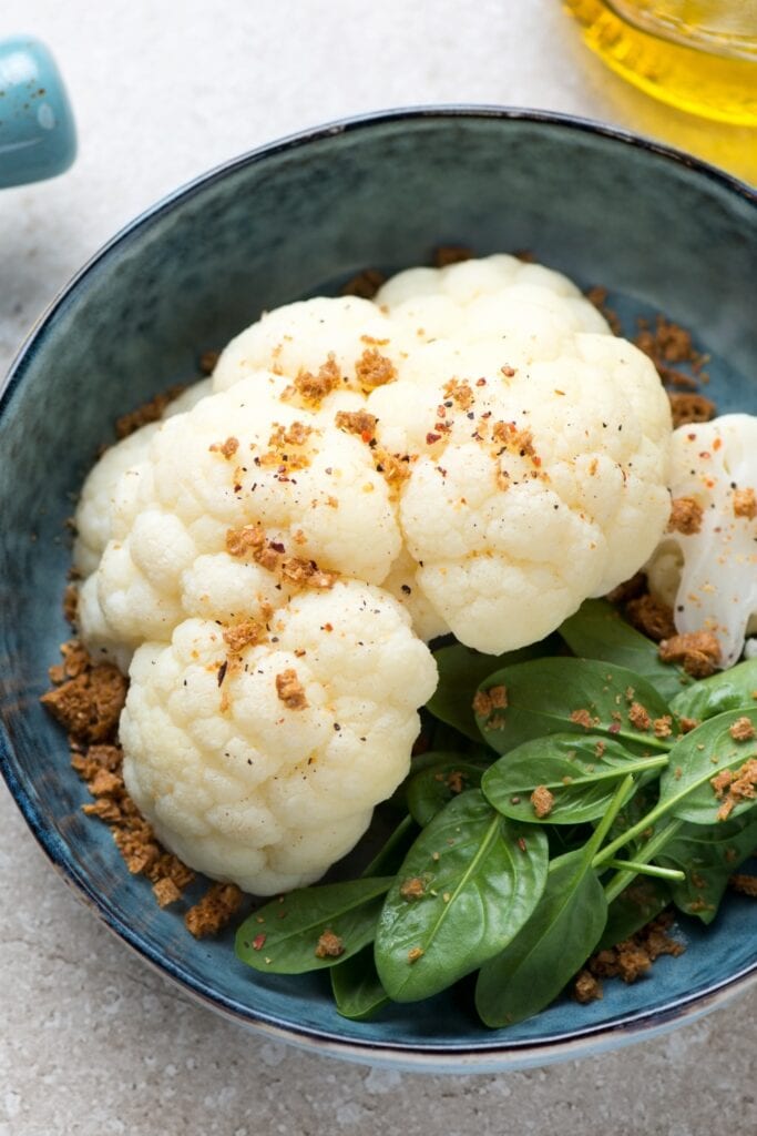 How to Steam Cauliflower in the Microwave featuring Steamed Cauliflower with Spinach and Seasoned Breadcrumbs