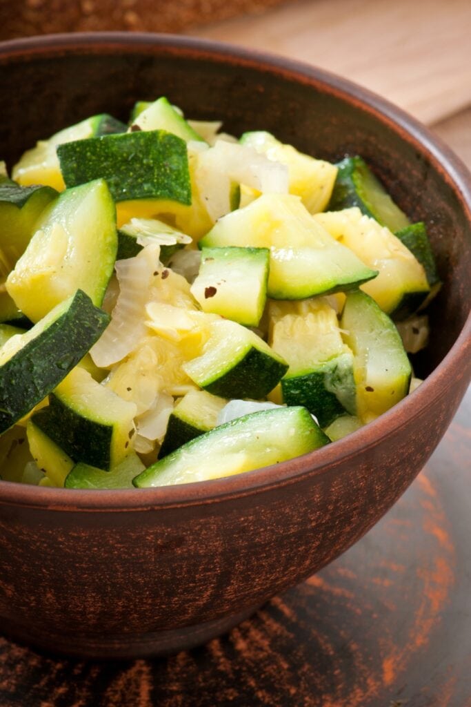 Steamed Zucchini in a Wooden Bowl